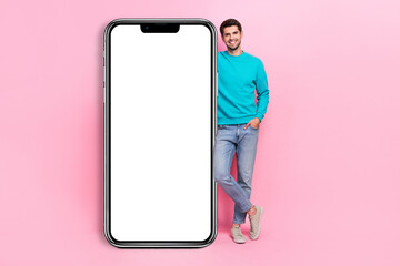 Aufkleber - Full size photo of nice young guy posing lean on blank white advert billboard wear trendy blue garment isolated on pink color background