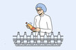 © Dzianis Vasilyeu - Female worker in uniform and headwear checking bottles on production line on factory. Woman employee control juice or milk quality at plant. Vector illustration.
