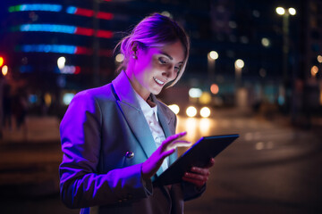 beautiful business woman working outdoor in a modern city..