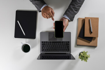 Poster - person designer computer laptop datum document research chart finance marketing Working on a white desk in an office workplace view overhead modern space flat lay