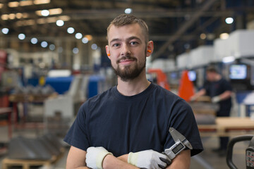 Wall Mural - Portrait confident worker in steel factory