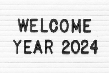 Canvas Print - Black color letter in word welcome year 2024 on white felt board background