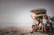 © Garun Studios - Happy family enjoying beach trip with their favorite car.