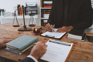 Wall Mural - Businessmen and lawyers, lawyers discuss and read details of treaty documents before signing investment contracts in financial business. justice concept