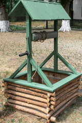 Old rural wooden well. Small wooden well in the village