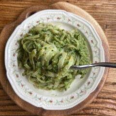 Wall Mural - Top view of delicious spaghetti pasta with avocado