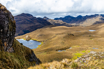 Wall Mural - Highlands of El Cajas National Park in the Ecuadorian Andes. Lake Negra at an altitude of 4050 m above sea level. Paramo ecosystem. Province of Azuay, near the city of Cuenca