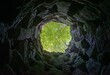 © Adrian Nantscheff/Wirestock Creators - Upward view from a well in Quinta da Regaleira, located near the historic center of Sintra, Portugal