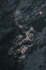 Sticker - Aerial top view of snowy mountain peaks