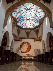 Canvas Print - Vertical shot of the interior of the San Nicolas Church in Granada, Spain.