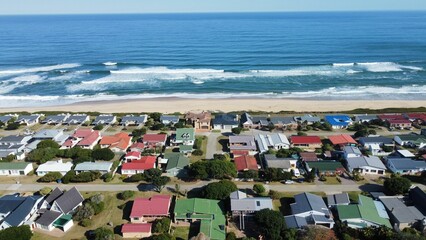 Wall Mural - Aerial view of Dwarswegstrandoord cityscape on the shore in South Africa