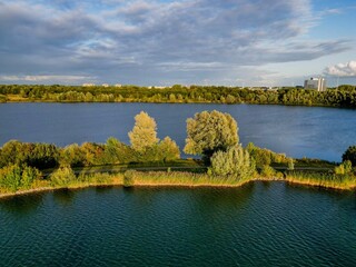 Wall Mural - Green path over a lake in IJsselstein, Utrecht, Netherlands