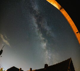 Poster - Night landscape with Milky Way, viewed from an European house