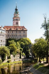 Poster - Vertical shot of the Cesky Krumlov Castle Tower by the river in Cesky Krumlov, Czechia