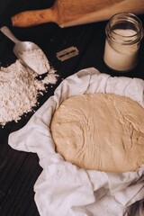 Sticker - Dough with flour and roller on table