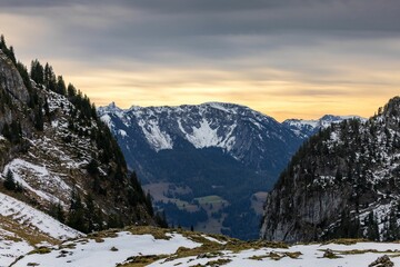 Wall Mural - Swiss Alps at sunset with a cloudy sky in the background, Stockholm, Sweden