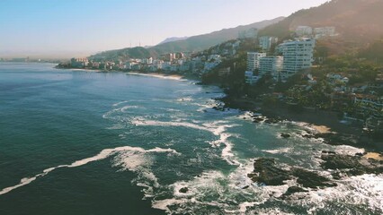 Poster - Aerial video of buildings and sea waves crashing on the shore, Puerto Vallarta, Mexico