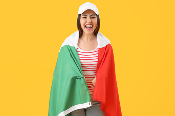 Poster - Young woman with flag of Italy on yellow background