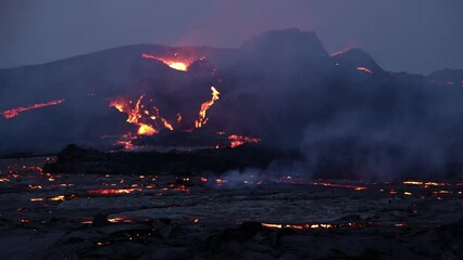 Wall Mural - Time lapse of moving burn lava on the ground under Fagradalsfjall Volcano in Iceland