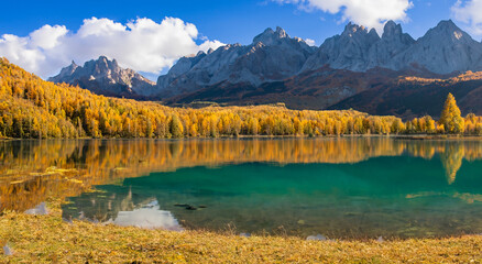 Wall Mural - beautiful fairytale landscape in autumn in europe with a big lake