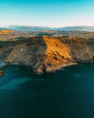 Sticker - Beautiful landscape of a cliff against the blue sky during the sunset