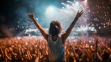 Fototapeta Sport - a young woman giving music concert performance in a huge crowded stadium arena hall on a stage. Epic lights and smartphone flashlights. Singer stretching her hands up. Generative AI
