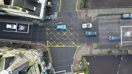 Wall Mural - Bird's eye view of the cars driving on the crossroads in Edinburgh