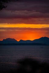 Canvas Print - Dramatic scenery of a beautiful sunset in the sky over the sea in Cannes, France