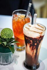 Canvas Print - Vertical shot of juice and smoothie with ice