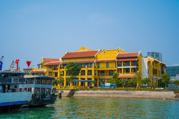 Wall Mural - Ha Long, VIETNAM - MAR 12 2023: Ha Long International Cruise Port's Marina has many cruise ships. Touristic Boats start jorneys over the Halong Bay which is UNESCO World heritage