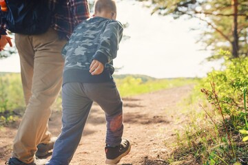 Sticker - father and sons footsteps on the trail 