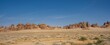 Panoramic of the sandstone mountains in the ancient Al-Ula, Saudi Arabia, against the blue sky