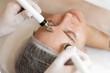 © Demetr White/Stocksy - White woman in cosmetology clinic