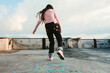 © Felipe Barrera/Stocksy - teenage girl crossing a hopscotch