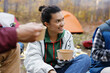 © Oleksii Syrotkin/Stocksy - Camping hang out companionship dinner meal happy