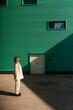 © Ezequiel Giménez/Stocksy - Stylish woman standing on street