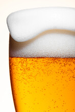 Beer Close-up With Wavy Foam
