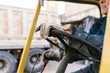 © Ezequiel Giménez/Stocksy - Crop workman driving fork truck