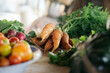 © Daniel Zapata/Stocksy - Vegetables on a table.