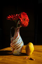 Still Life With Pear And Gerberas.