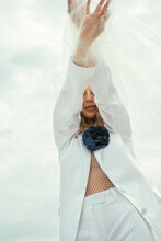 Beautiful Bride In White Suit Hiding Her Face