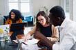 © Bruce and Rebecca Meissner/Stocksy - Boardroom Meeting