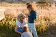 © ByLorena/Stocksy - Grandmother spending quality time with grandsons