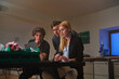 © MEM Studio/Stocksy - Developers working on creating a new device in an office