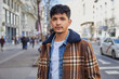 © Edward Córdoba/Stocksy - Portrait of Young Latin Man In City Center