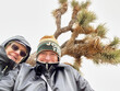 © Rowena Naylor/Stocksy - UGC Selfie pose by couple in Joshua Tree Nation Park