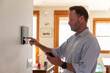 © Raymond Forbes LLC/Stocksy - Smart Home technology Panel system  in Home