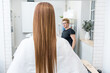 © Alvaro Lavin/Stocksy - woman with beautiful long brown hair freshly combed