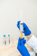 © Alvaro Lavin/Stocksy - doctor showing the plasma specimens extracted from the machine