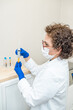 © Alvaro Lavin/Stocksy - doctor showing the plasma specimens extracted from the machine